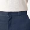 Pantalones cortos de trabajo de corte holgado y frente liso, 33 cm